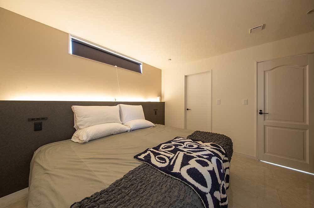 すまいポート21水戸・つくば体験談　一流ホテルにも選ばれる上質のベッドと間接照明  心地よい眠りを約束するホテルライクな主寝室の写真